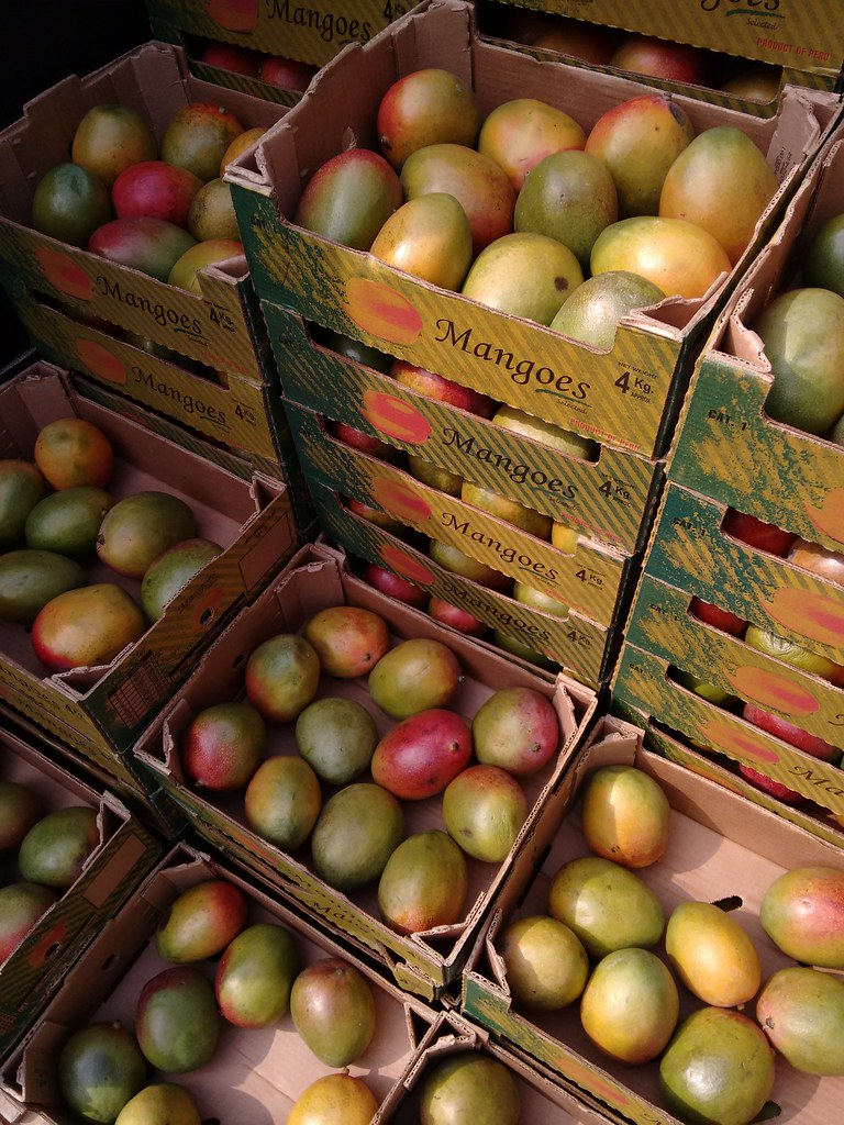 Mangoes in boxes. Credit: uncoolbob/Flickr